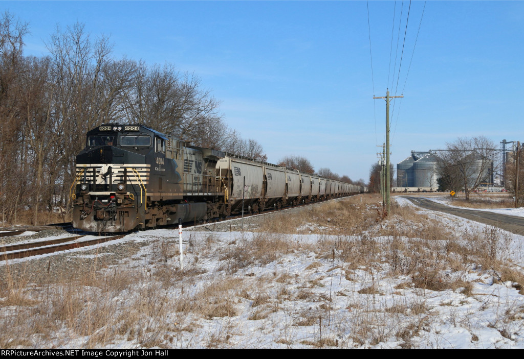 NS 4004 pumps up the air on a grain train before backing on to the last cut of cars